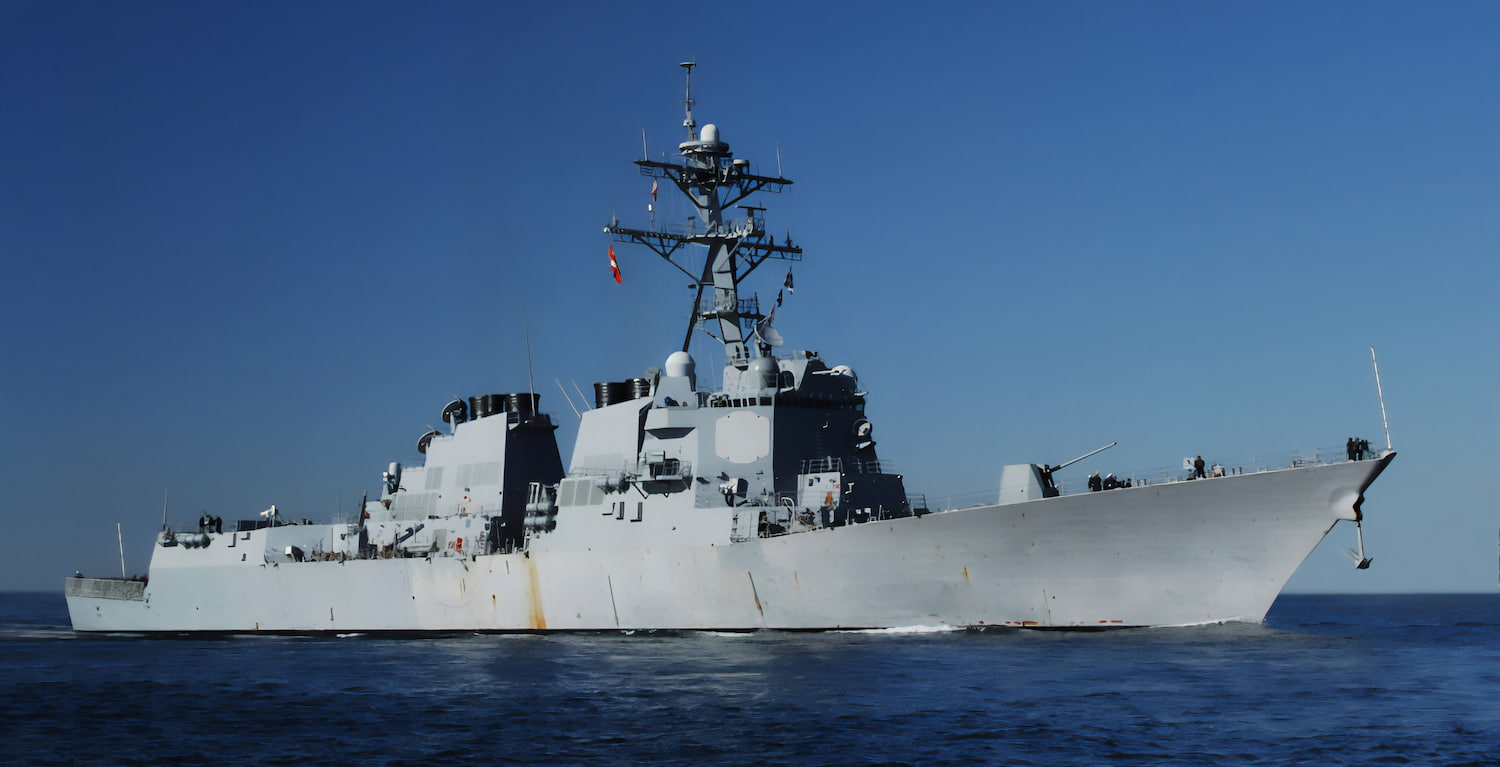 A profile view of military ship at sea